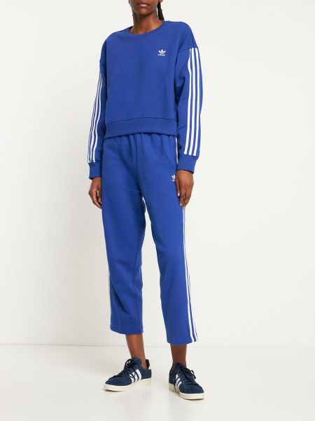 Nohavice Adidas Originals modrá