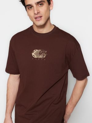 Brīva piegriezuma kokvilnas polo krekls ar apdruku Trendyol brūns