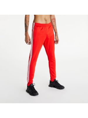 Slim fit sportovní kalhoty Adidas červené