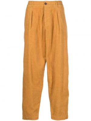 Plisované manšestrové kalhoty relaxed fit Universal Works žluté