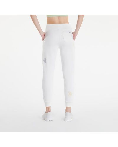 Kostkované sportovní kalhoty s paisley potiskem Vans bílé