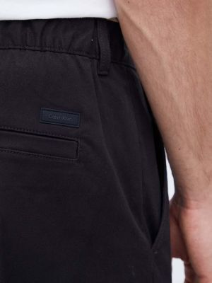 Jednobarevné kalhoty Calvin Klein černé