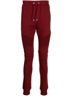 Teplákové nohavice s potlačou Balmain červená
