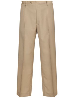 Pantalones de lana con estampado tropical bootcut Auralee beige