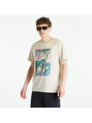 Tričko s krátkým rukávem New Balance At Graphic T-Shirt  - Béžová