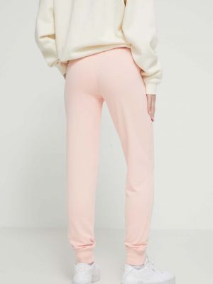 Bavlněné sportovní kalhoty s aplikacemi Superdry růžové