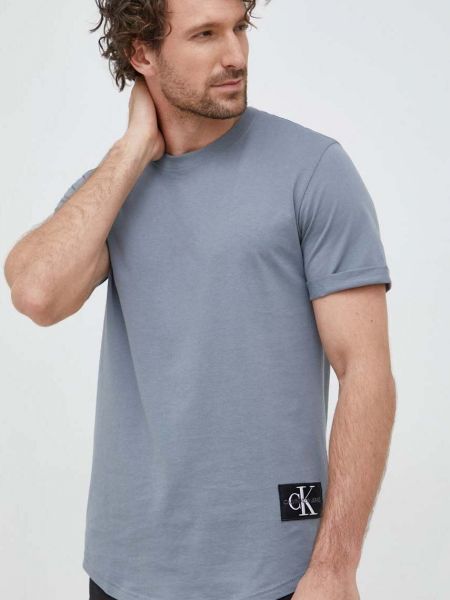 Памучна тениска с дълъг ръкав с апликация Calvin Klein Jeans