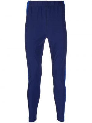 Sportovní kalhoty skinny fit s potiskem Moncler Grenoble modré