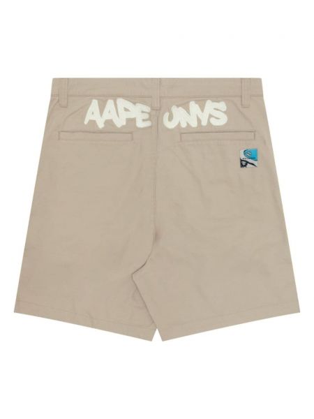 Pantalon chino avec applique Aape By *a Bathing Ape® beige