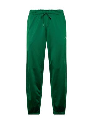 Teplákové nohavice Reebok zelená