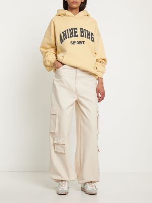 Medvilninis džemperis su gobtuvu Anine Bing geltona