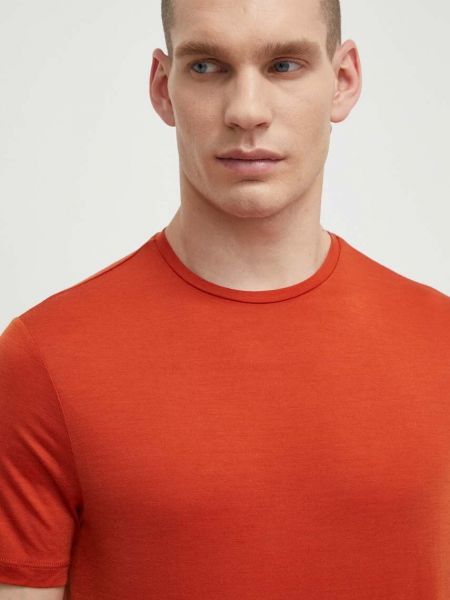 Športna majica iz merina Icebreaker oranžna