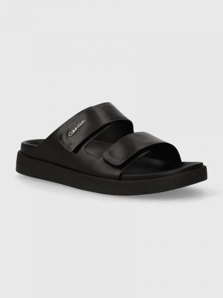 Černé kožené pantofle bez podpatku Calvin Klein