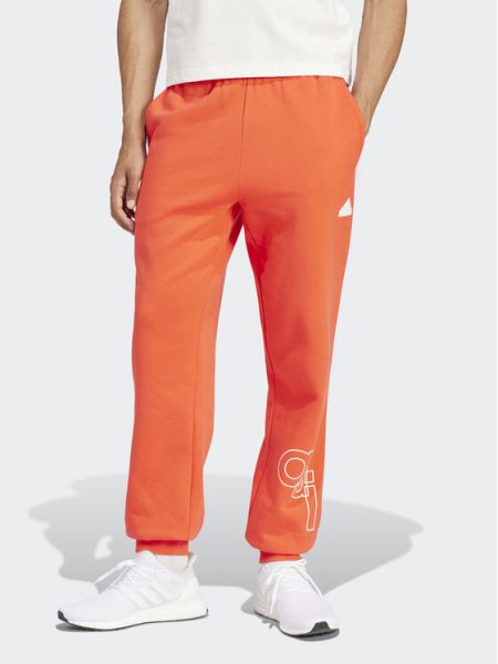 Pantaloni sport cu imagine Adidas roșu