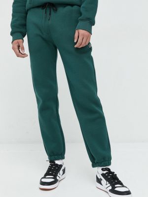 Однотонные спортивные штаны Kangol зеленые