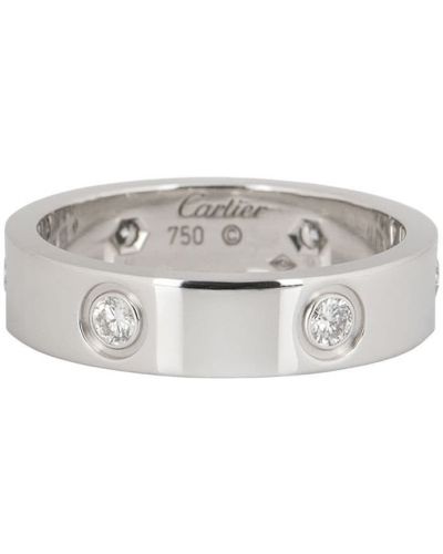 С бриллиантом кольцо Cartier