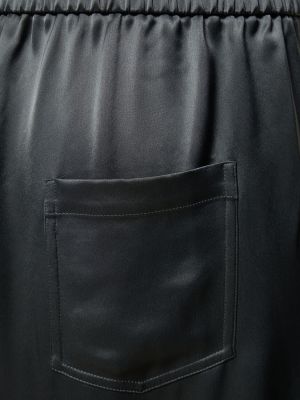Saténové kalhoty relaxed fit Nanushka černé