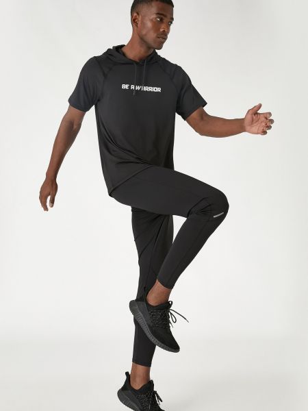 Sportovní kalhoty skinny fit Koton černé