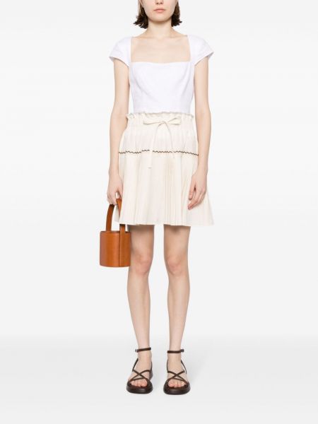 Plisované bavlněné mini sukně Ulla Johnson bílé