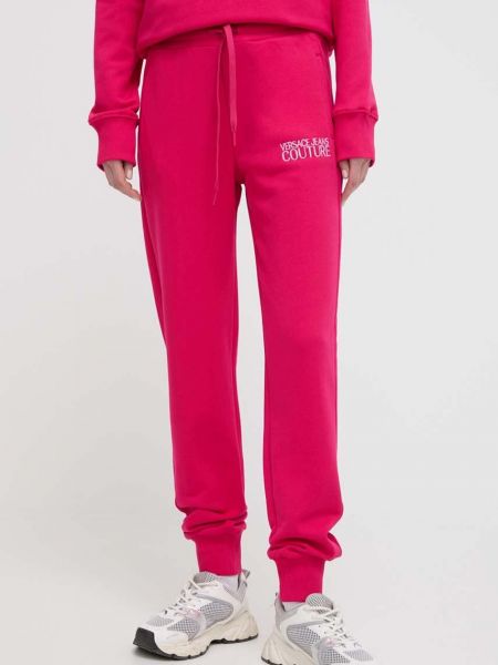 Спортивні штани з аплікацією Versace Jeans Couture рожеві