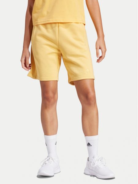 Żółte spodenki sportowe Adidas