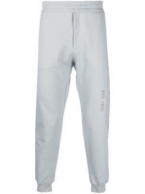 Pantalon de joggings en coton à imprimé Alexander Mcqueen gris