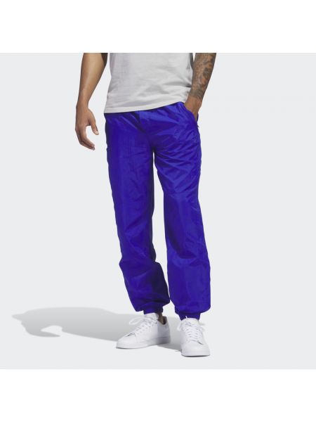 Nylonowe spodnie sportowe Adidas niebieskie