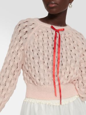 Moherowy sweter z kokardką Simone Rocha różowy