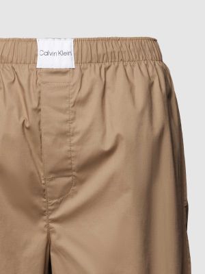 Beżowe spodnie Calvin Klein Underwear