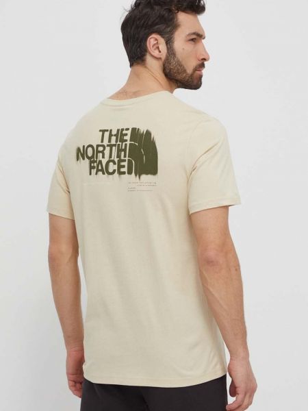 Koszulka bawełniana z nadrukiem The North Face beżowa