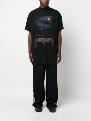 Koszulka z dziurami z nadrukiem Balenciaga czarna