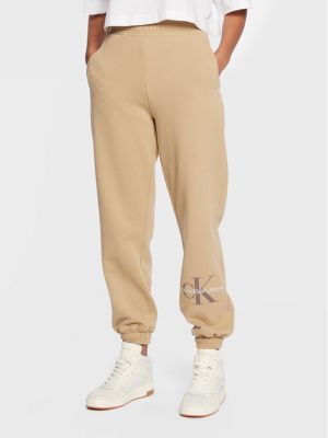 Pantaloni sport cu croială lejeră Calvin Klein Jeans bej