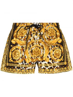 Pantaloni scurți cu imagine Versace galben