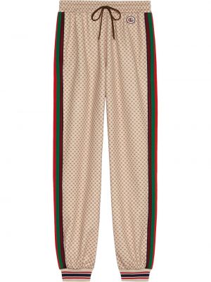 Spodnie sportowe z nadrukiem Gucci beżowe
