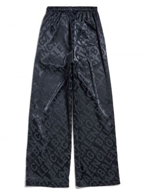 Satynowe spodnie z nadrukiem Balenciaga szare