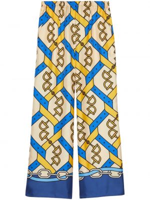 Pantaloni de mătase cu imagine Gucci galben