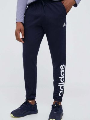 Kalhoty s potiskem Adidas