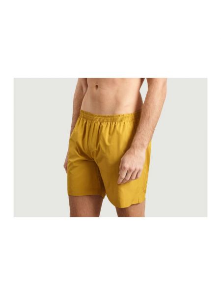 Pantalones cortos True Tribe amarillo