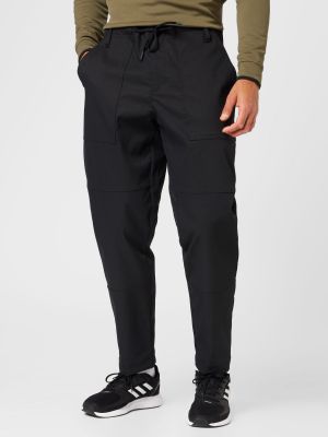 Teplákové nohavice Adidas Golf čierna