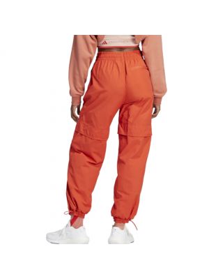 Плетеные спортивные штаны Adidas By Stella Mccartney оранжевые
