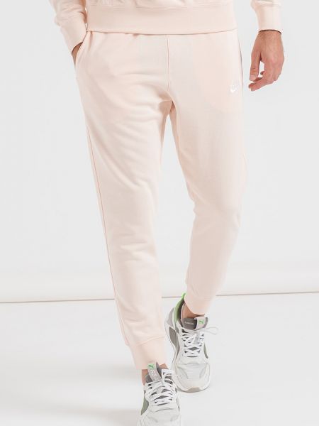 Спортивные штаны слим с карманами Nike розовые