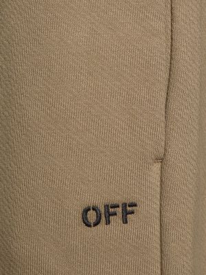 Bavlnené teplákové nohavice Off-white béžová