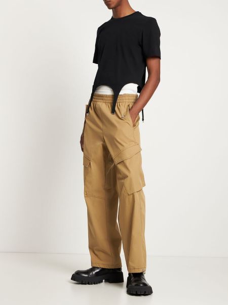 Bavlněné kalhoty z nylonu Dion Lee černé