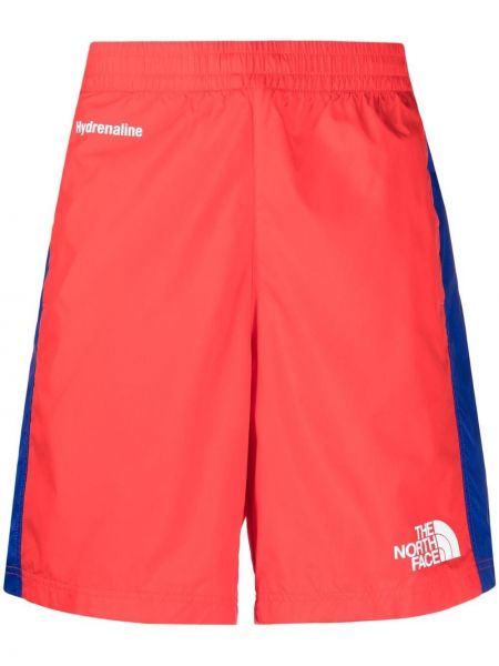 Pantalones cortos deportivos con estampado The North Face rojo