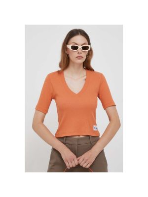 Pólóing Calvin Klein Jeans narancsszínű