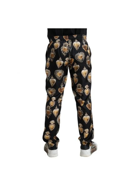 Jedwabne spodnie sportowe z nadrukiem w serca Dolce And Gabbana czarne
