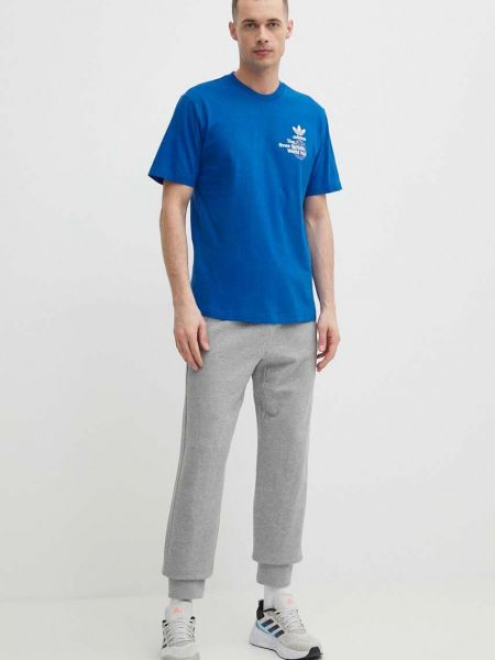 Koszulka bawełniana z nadrukiem Adidas niebieska