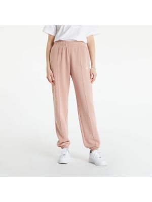 Fleecové sportovní kalhoty Nike růžové