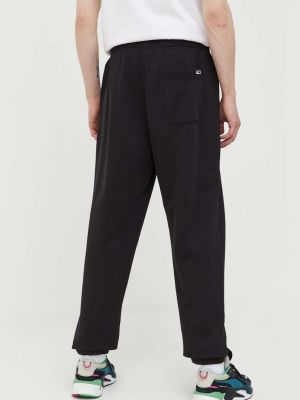 Bavlněné sportovní kalhoty s aplikacemi Tommy Jeans černé