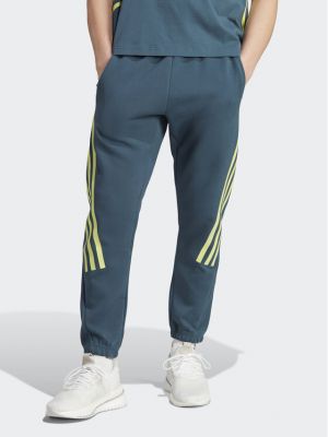 Pantaloni sport slim fit cu dungi Adidas